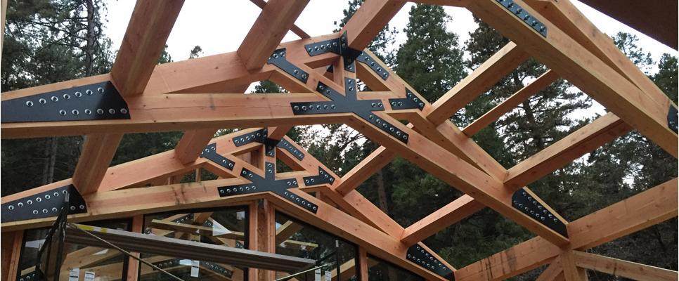 Custom manufactured beam plates, truss brackets, and structural steel connectors produced at The High Road Manufacturing