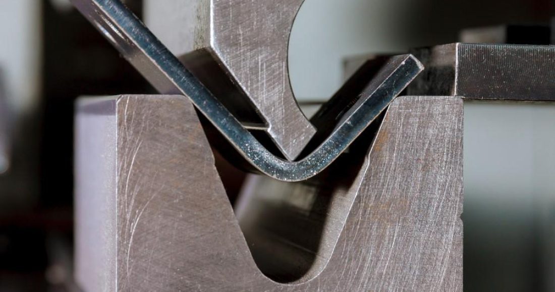 CNC press brake forming machine bending sheet metal with precision dies at The High Road Manufacturing in Ponderay, Idaho